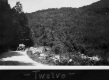 Car driving along a dirt road