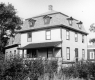 A building with a Mansard Roof