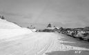 Automobiles in a snowy parking lot