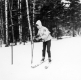 Young Skier Skiing Down a Mountain