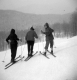 Skiers Skiing down Spruce in Stowe, VT