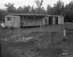 House and wire fence