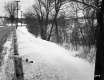 Highway through Snow Covered Landscape