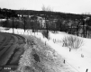 Highway and River through Snow Covered Landscape