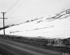 Highway through Snow Covered Landscape