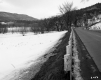 Highway through Snow Covered Landscape