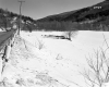 Highway through Snow Covered Landscape