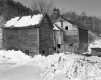 Connected Barns in the Snow