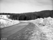 Highway through Snow Covered Landscape