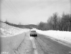 Highway through Snow Covered Landscape