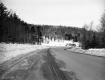 Highway through Snow Covered Landscape