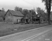 Wooden House by Road