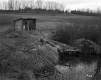 Wooden Shack on Field