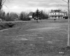 Field in front of Houses