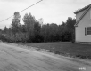 House by Dirt Road