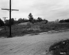 Dirt Road by Electrical Poles