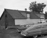 Cars in front of House