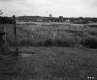 Grassy Field and Building