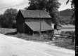 House by Field and Road