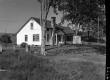 House and Stone Wall