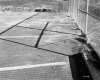 Seaway Shopping Center East View of Parking Spaces with Car in Background