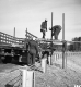 Burlington Interstate 89 Four Men Support Poles for Sign