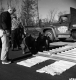 Four Men with Sign and Standard Truck