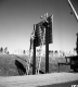 Two Men Securing Sign Interstate 189