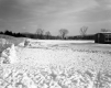 East View of Parking Lot and School Fence Foreground
