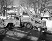 Waterville Two Trucks Clearing Snow
