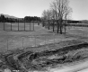 Construction next to Building and Field Looking Southwest