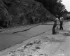 Two Men Work on Route 7 Roadway