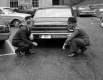 Gov. Philip H. Hoff and Highway Commissioner Russell A. Holden Display ""Keep VT Beautiful"" Sticker