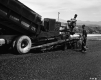Two Men with Pike Construction Vehicle