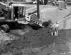 Two Men at Construction Site