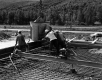Four Men on Machinery at I-89 Construction Site