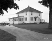 Home with Driveway and Automobile