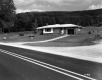 Dwelling Next to Paved Road 