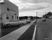 Buildings and Two Gas Stations Next to Road