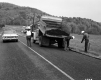Three Men Work on Route 100B