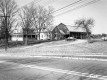 House and Barn behind Road