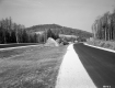 Two Lane Highway in front of Hill
