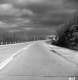Highway with Storm Clouds Above