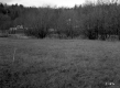 Grassy field with Dwelling House