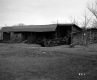 Barn with Tractor and Hay