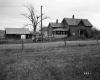 Wooden House by Road