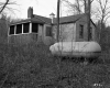 Tank Behind House