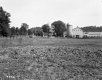 Farm by Field and Road