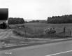Field and Farm by Paved Road