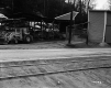 Wiggins Property, Lumber in Shed along Railroad Tracks